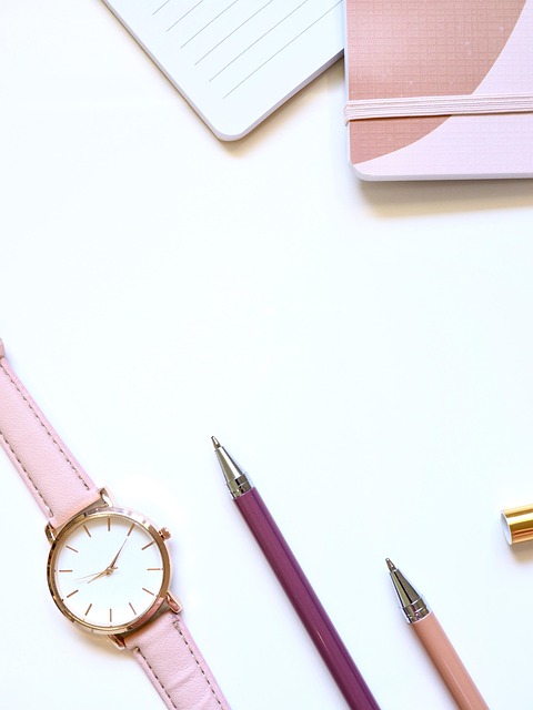 journal with habit tracker and warm gold light minimalist desk